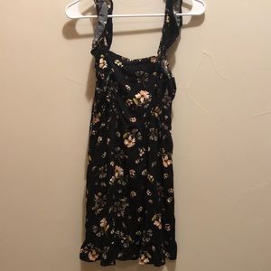 Black summer dress with yellow floral pattern